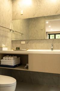 Ένα μπάνιο στο Grace Garden Coffee Homestay +56 φωτογραφίες