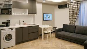 Kuchyň nebo kuchyňský kout v ubytování Meyde Boutique Suites
