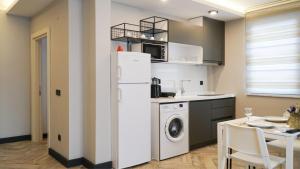 Kuchyň nebo kuchyňský kout v ubytování Meyde Boutique Suites