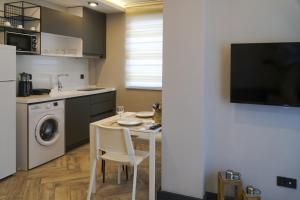 Kuchyň nebo kuchyňský kout v ubytování Meyde Boutique Suites
