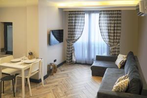 TV a/nebo společenská místnost v ubytování Meyde Boutique Suites