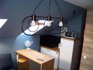 Кухня или мини-кухня в Sapphire Apartment
