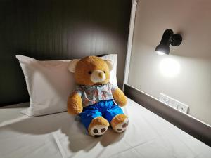Postel nebo postele na pokoji v ubytování Napa Hostel Samrong Station