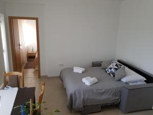 Posteľ alebo postele v izbe v ubytovaní Apartments Tri Mora