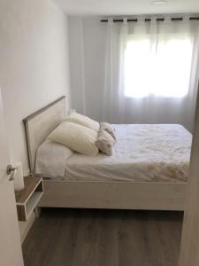 Posteľ alebo postele v izbe v ubytovaní Sun & Beach Pobla