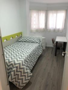 Posteľ alebo postele v izbe v ubytovaní Sun & Beach Pobla
