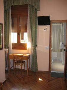 Postel nebo postele na pokoji v ubytování Hostal La Selecta