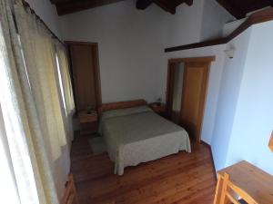 Postel nebo postele na pokoji v ubytování Agriturismo Bozica