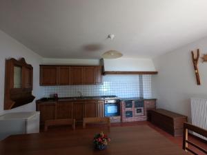 Kuchyň nebo kuchyňský kout v ubytování Agriturismo Bozica