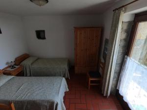 Postel nebo postele na pokoji v ubytování Agriturismo Bozica