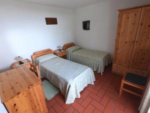 Katil atau katil-katil dalam bilik di Agriturismo Bozica