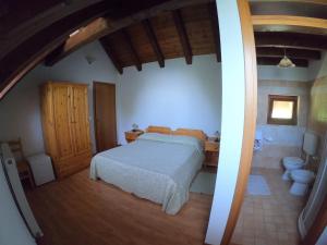 Postel nebo postele na pokoji v ubytování Agriturismo Bozica