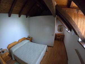 Postel nebo postele na pokoji v ubytování Agriturismo Bozica