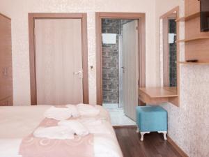 Postel nebo postele na pokoji v ubytování HOTEL MİKLAGORD
