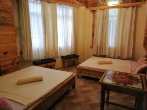 Una cama o camas en una habitación de Sagada Lodging Home