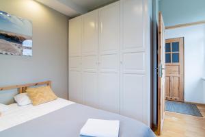 Posteľ alebo postele v izbe v ubytovaní Sopot Suite