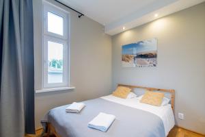 Posteľ alebo postele v izbe v ubytovaní Sopot Suite