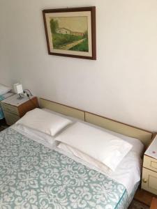 Postel nebo postele na pokoji v ubytování B&B LOKEV Sezana