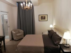 Postel nebo postele na pokoji v ubytování DreaMilan B&B
