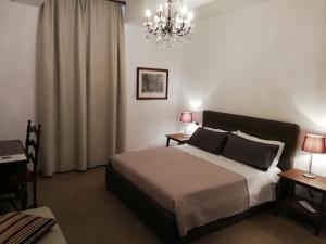 Postel nebo postele na pokoji v ubytování DreaMilan B&B