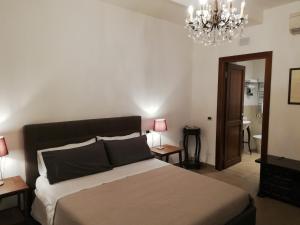 Postel nebo postele na pokoji v ubytování DreaMilan B&B