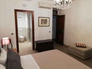 Postel nebo postele na pokoji v ubytování DreaMilan B&B