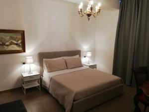 Postel nebo postele na pokoji v ubytování DreaMilan B&B