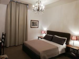 Postel nebo postele na pokoji v ubytování DreaMilan B&B