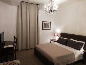 Postel nebo postele na pokoji v ubytování DreaMilan B&B