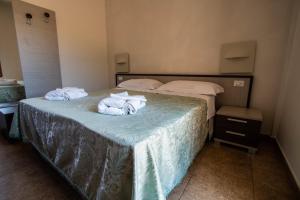Postel nebo postele na pokoji v ubytování Hotel Eden