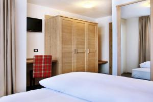 Posteľ alebo postele v izbe v ubytovaní B&B La Tranquillitè