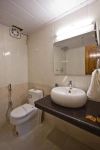 Kopalnica v nastanitvi Hotel Hayer Regency