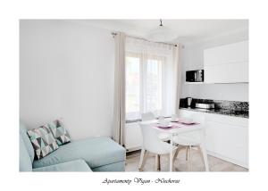 Kuchyň nebo kuchyňský kout v ubytování Vigan Apartamenty