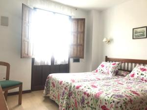 Posteľ alebo postele v izbe v ubytovaní Hotel Salldemar