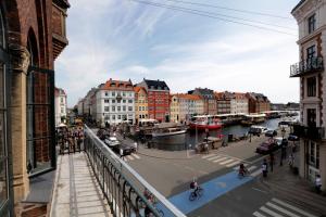 a view of a city with a river and buildings at Hotel Bethel in Copenhagen