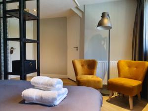 Posezení v ubytování B&B Dennenbos