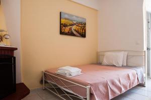 Postel nebo postele na pokoji v ubytování Maria Village