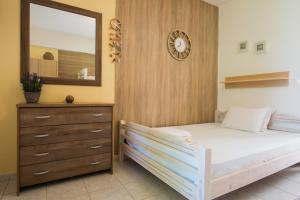 Postel nebo postele na pokoji v ubytování Maria Village