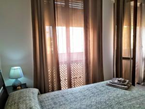 Postel nebo postele na pokoji v ubytování B&B Libellula