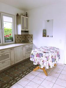 Kuchyň nebo kuchyňský kout v ubytování Guests house "Like Home"