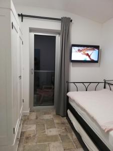 Posteľ alebo postele v izbe v ubytovaní Villa Perla Dalmatica