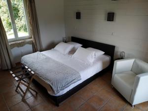Postel nebo postele na pokoji v ubytování Bastide De Luzert