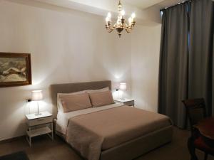 Postel nebo postele na pokoji v ubytování DreaMilan B&B