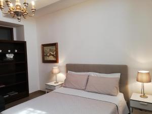 Postel nebo postele na pokoji v ubytování DreaMilan B&B