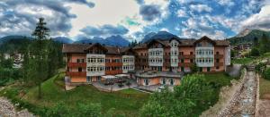 a cityscape of a town with houses and buildings at Residence Pez Gajard in San Martino di Castrozza