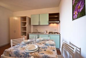 Кухня или мини-кухня в Casa Del Golfo
