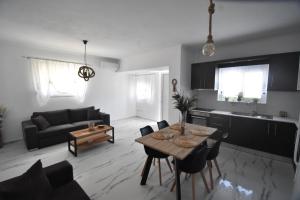 Posezení v ubytování Anesis Apartment