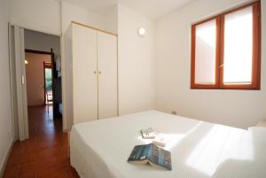 Кровать или кровати в номере Casa Del Golfo