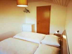 Ein Bett oder Betten in einem Zimmer der Unterkunft Haus Vordertiefenbach