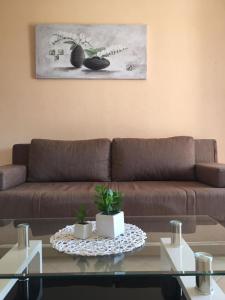 Ein Sitzbereich in der Unterkunft Apartments Sanja